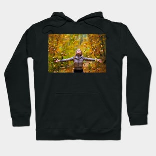 Young lady throwing up leaves Hoodie